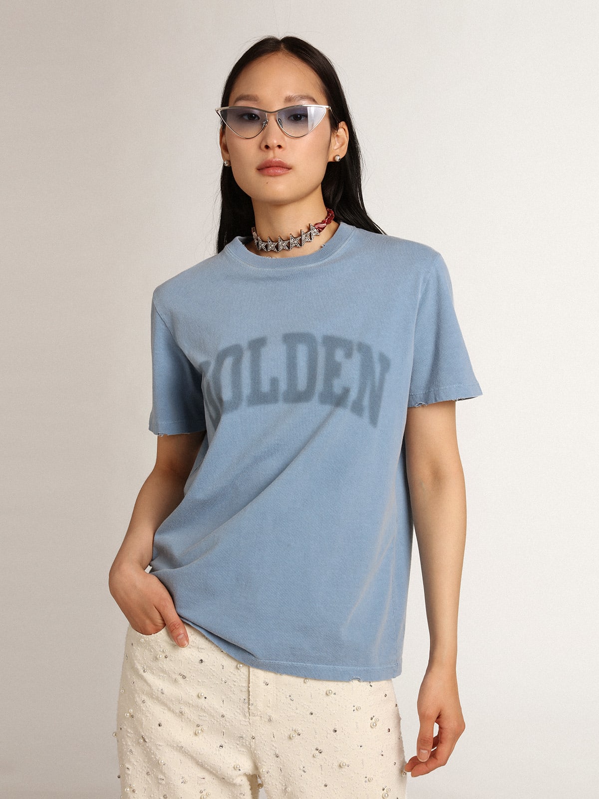 T-shirt Collezione Journey color blu harbor dall'effetto distressed con scritta Golden ton sur ton