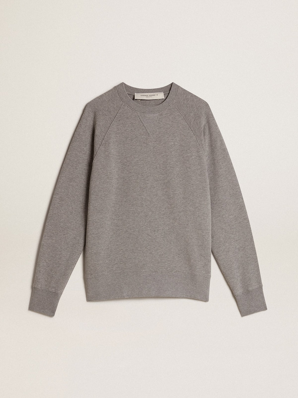 Felpa in cotone color grigio melange con manifesto sul retro