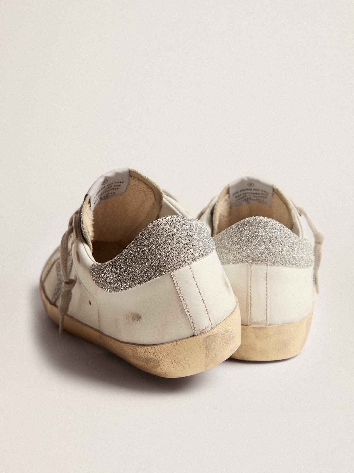 Sneaker Super-Star con tomaia in pelle bianca e inserti in cristalli Swarovski
