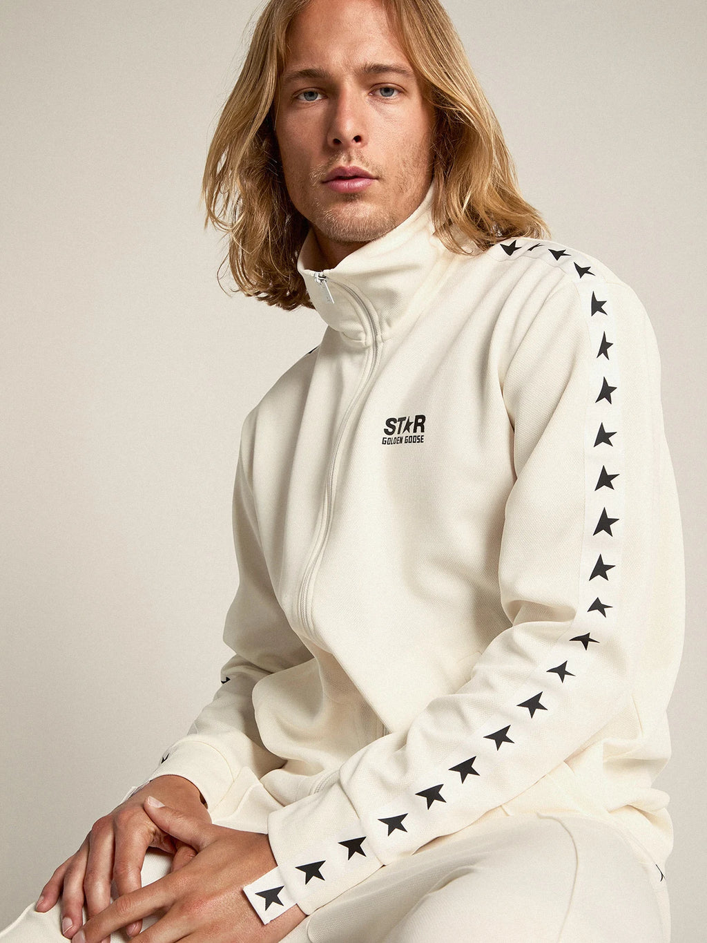 Felpa con zip da uomo di colore bianco con nastro bianco e stelle nere