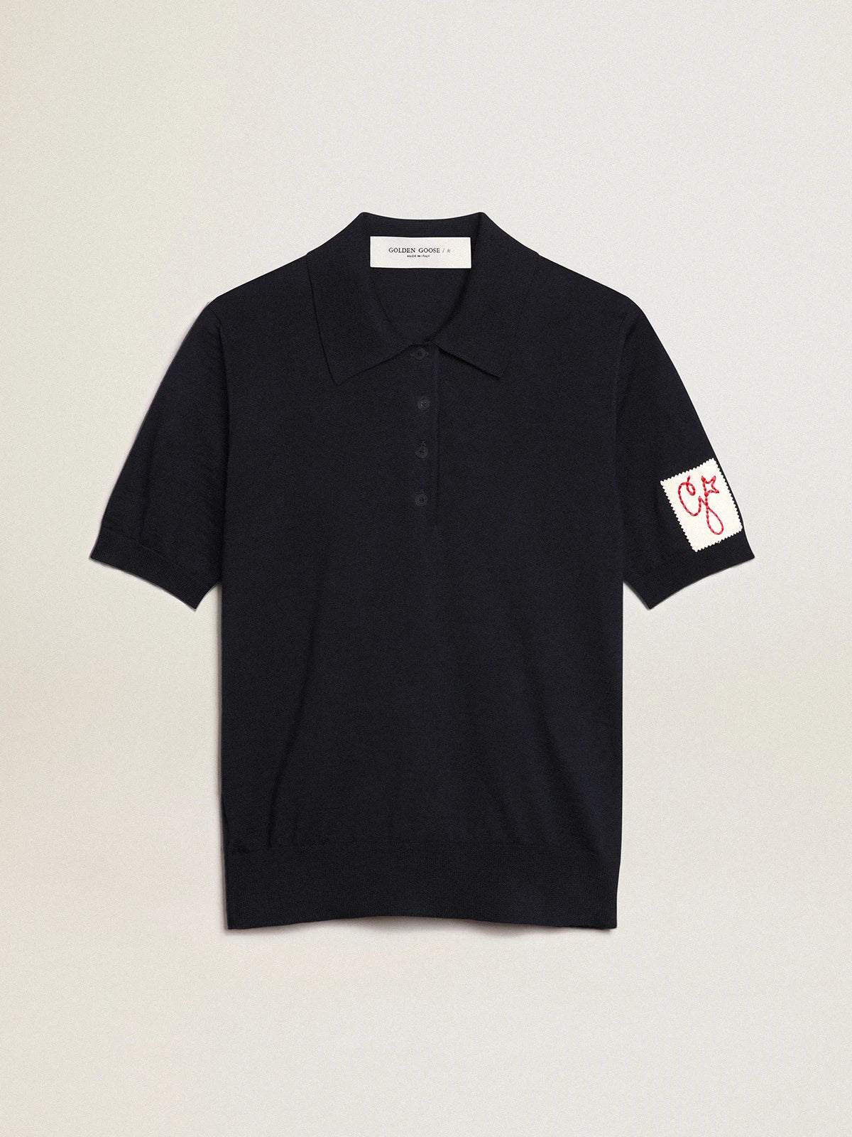 Polo da donna in lana merino di colore blu navy